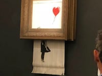 181006-banksy-painting-self-destructs-cheat_aufdgn