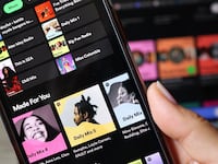 NEW YORK, NEW YORK - JUNE 04: In this photo illustration, the Spotify music app is seen on a phone on June 04, 2024 in New York City. Spotify made an announcement that it will be raising the price of its Spotify Premium Individual plan by $1, from $10.99 to $11.99 per month and the Premium Family plan by $3, from $16.99 to $19.99 per month. (Photo Illustration by Michael M. Santiago/Getty Images)