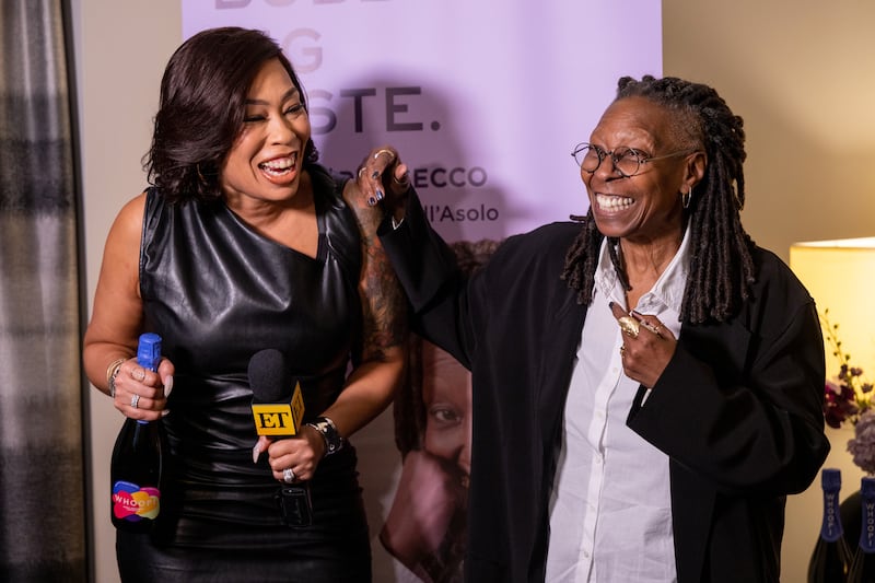 Whoopi Goldberg and her daughter Alex Martin Dean laugh together on February 28 in Los Angeles.