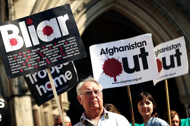 articles/2012/05/28/tony-blair-testifies-about-murdoch-s-influence/blair-leveson-protesters-cheat_t4rifw