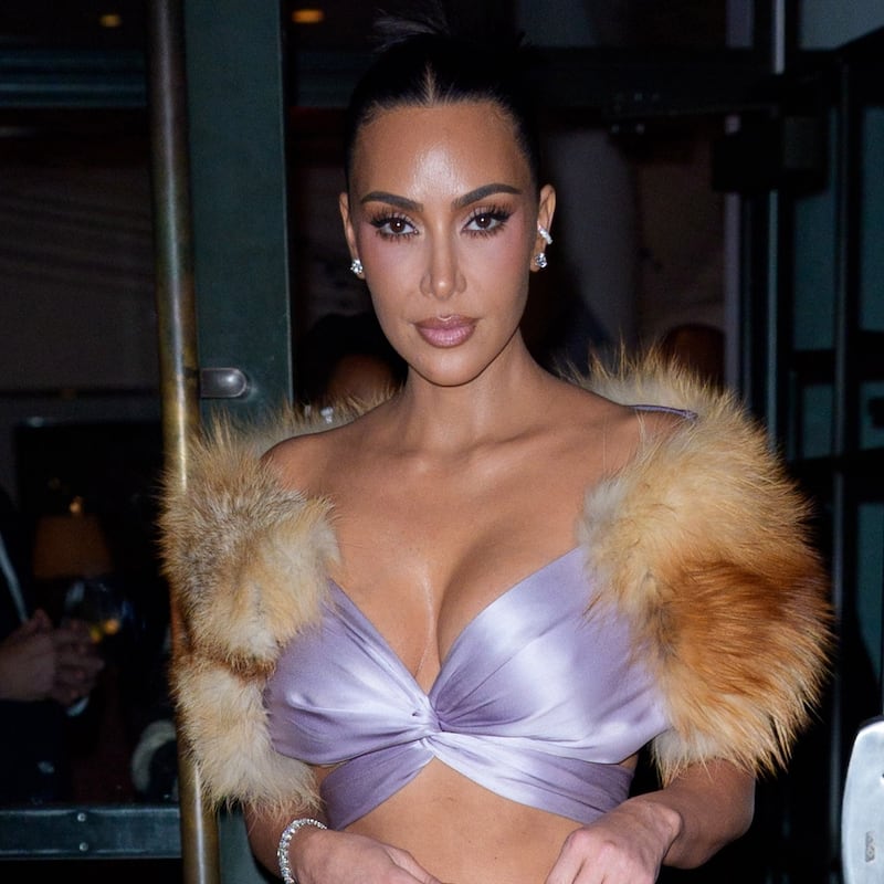 Kim Kardashian wearing a fur stole on October 28, 2025, in New York City.