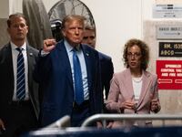 Donald Trump appears at his hush money trial in New York.