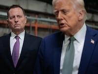 U.S. President Donald Trump speaks to the media alongside Richard Grenell.