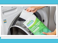 Earth Breeze products being used to wash clothes.