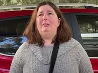 Erin Patterson speaks to reporters after serving a meal using mushrooms believed to have killed three people in Australia.