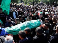 Palestinians attend a funeral of those killed in an airstrike in Jenin.