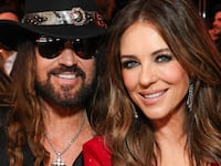 Billy Ray Cyrus and Elizabeth Hurley attend the 59th Country Music Association Awards in 2025.