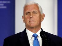 Former U.S. Vice President Mike Pence stands at the podium after announcing he will discontinue his presidential campaign, during the Republican Jewish Coalition Annual Leadership Summit in Las Vegas, Nevada, Oct. 28, 2023.