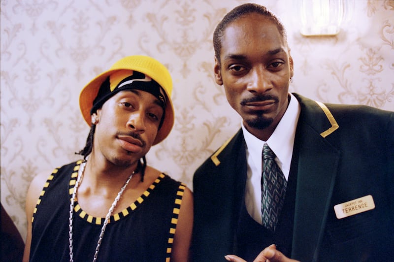 American rapper and actor Ludacris and American rapper, record producer, and actor Snoop Dogg pose for a photo in August 2003 in Los Angeles, California.
