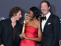 Jeremy Allen White, Ayo Edebiri, and Ebon Moss-Bachrach on the red carpet at the Golden Globe Awards.