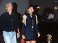 Jeffrey Epstein and Ghislaine Maxwell attend the “Batman Forever” premiere.
