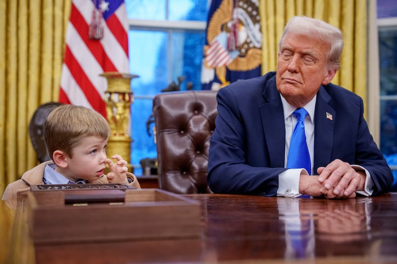 X Musk, the son of Tesla and SpaceX CEO Elon Musk, stands next to U.S. President Donald Trump during an executive order signing in the Oval Office at the White House on February 11, 2025 in Washington, DC. Trump is to sign an executive order implementing the Department of Government Efficiency's (DOGE) "workforce optimization initiative," which, according to Trump, will encourage agencies to limit hiring and reduce the size of the federal government. (Photo by Andrew Harnik/Getty Images)