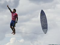 Gabriel Medina celebrating after perfect wave.