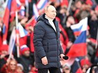 Vladimir Putin gives a speech at a concert marking the eighth anniversary of Russia's annexation of Crimea at the Luzhniki stadium in Moscow, Russia, on March 18, 2022.