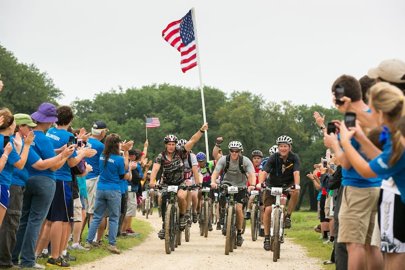galleries/2013/05/26/george-w-bush-joins-memorial-day-wounded-warrior-100k-mountain-bike-ride/130526-McKinnon-Vets-Bush-tease_ggohc8
