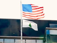 The "An Appeal to Heaven" flag flew below the American flag at the Small Business Association this month.