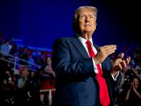 U.S. Republican Presidential nominee former President Donald Trump greets attendees upon arrival at his campaign rally at the Bojangles Coliseum on July 24, 2024 in Charlotte, North Carolina.