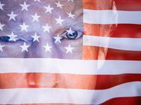 Double exposure photograph of the United States flag and the official portrait of their president Donald Trump at Kerlouan in Brittany in France on August 12 2025. (Photo by Vincent Feuray / Hans Lucas via AFP) (Photo by VINCENT FEURAY/Hans Lucas/AFP via Getty Images)