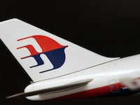articles/2014/05/05/passenger-flights-must-stop-carrying-lithium-ion-batteries-as-cargo/140502-irving-mh370-tease_jgaflc