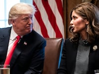 President Donald J. Trump speaks with Kristi Noem.