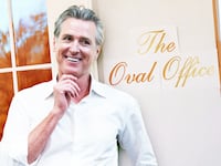 A photo illustration of Gov. Gavin Newsom and the temporary signage reading "The Oval Office" is displayed next to an entrance to the Oval Office at the White House.