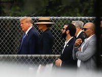 Donald and Melania Trump enter son Barron’s graduation ceremony in West Palm Beach, Florida.