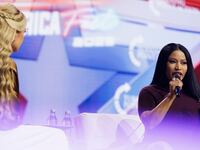 PHOENIX, ARIZONA - DECEMBER 21: Erika Kirk interviews surprise guest Nicki Minaj on the final day of Turning Point USA's annual AmericaFest conference at the Phoenix Convention Center on December 21, 2025 in Phoenix, Arizona. Minaj spoke about her frustrations with California Governor Gavin Newsom, and about why she has embraced the conservative movement. (Photo by Caylo Seals/Getty Images)
