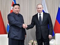 Russian President Vladimir Putin meets with North Korean leader Kim Jong Un at the Far Eastern Federal University campus.
