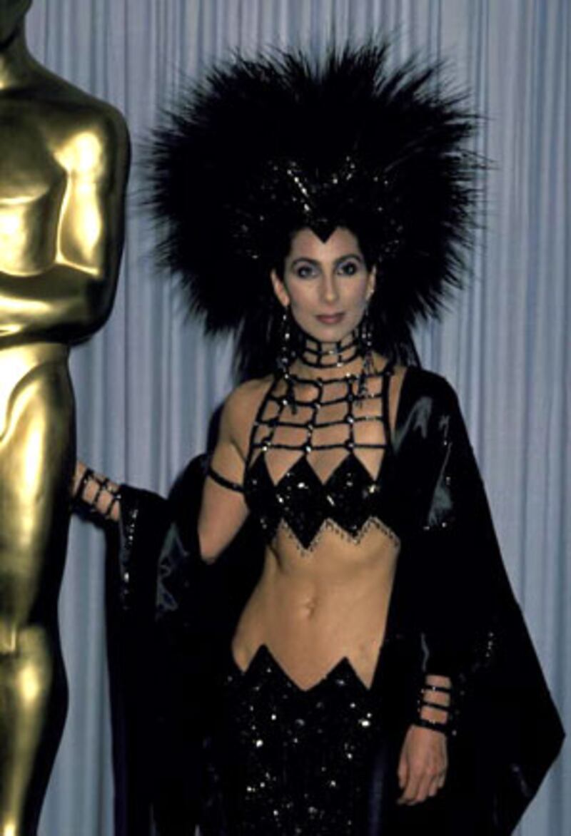 Cher's ab-baring outfit at the 1986 Oscars was designed by Bob Mackie.