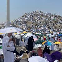 Prospective pilgrims pray at the Jabal ar-Rahmah in Arafat as Muslims continue their worship to fulfill the Hajj pilgrimage in Mecca, Saudi Arabia, on June 15, 2024.