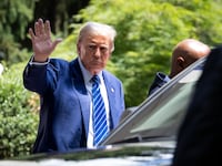 Ex-President and convicted felon Donald Trump waves to supporters