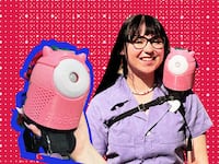 SkoBot inventor Danielle Boyer wears one of her customizable language-teaching devices strapped to her shoulder.
