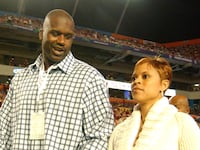 Shaquille O'Neal and wife Shaunie attend the FedEx Orange Bowl National Championship at Pro Player Stadium in Miami, Florida on January 4, 2005.