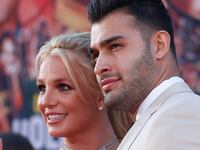 Britney Spears and Sam Asghari pose at the premiere of "Once Upon a Time In Hollywood."