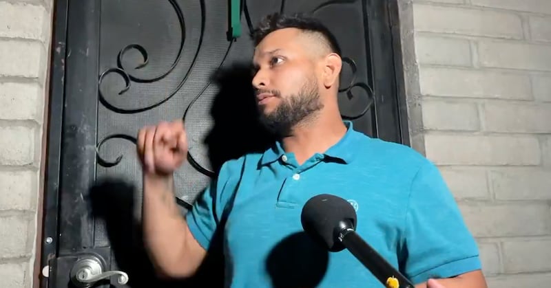The man, identified as Carlos Palazuelos, speaking to reporters outside his home.