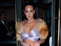 Kim Kardashian wearing a fur stole on October 28, 2025, in New York City.