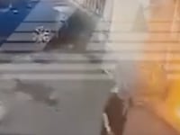 A woman setting fire to a military enlistment office in St. Petersburg, Russia, after claiming to have been targeted by a scammer.