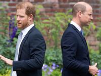 Britain's Prince Harry, Duke of Sussex (L) and Britain's Prince William, Duke of Cambridge attend the unveiling of a statue of Princess Diana at The Sunken Garden in Kensington Palace on July 1, 2021, which would have been her 60th birthday.