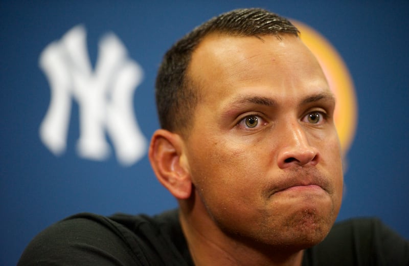 New York Yankees Third Baseman Alex Rodriguez addresses the media after playing a minor league game for the AA Trenton Thunder in Trenton, NJ on August 3, 2013. He is facing a suspension by Major League Baseball for his alleged use of steroids with the Biogenesis clinic in Florida. (Photo by Mark Makela/Corbis via Getty Images)