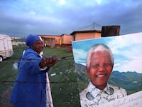 articles/2013/12/15/nelson-mandela-laid-to-rest-in-moving-funeral-ceremony/131215-mandela-gevisser-tease_ufi8zd