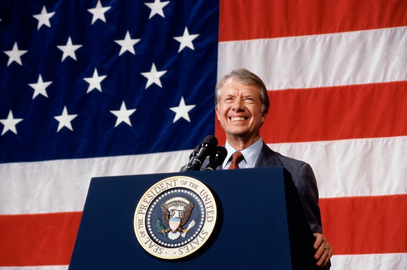 President Jimmy Carter addressing a town meeting.