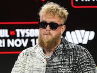 Jake Paul speaks during a press conference at Fanatics Fest NYC at Javits Center on August 18, 2024 in New York City.