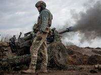 Ukrainian forces firing a mortar