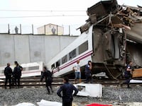 galleries/2013/07/24/dozens-dead-as-train-derails-in-spain-photos/130724-spain-train-5_brsgl8