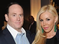 John Phelan and Amy Phelan attend an exhibition of new paintings by renowned American artist Marc Dennis, at the Christopher Guy London Showroom on March 10, 2015 in London, England.