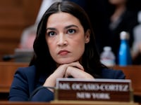 WASHINGTON, DC - MAY 13: Rep. Alexandria Ocasio-Cortez (D-NY) listens during a mark up meeting with the House Committee on Energy and Commerce committee on Capitol Hill on May 13, 2025 in Washington, DC. The committee met to discuss legislative recommendations for budget reconciliation. The committee room was surrounded by protesters fearing cuts or increased costs to medicaid. (Photo by Anna Moneymaker/Getty Images)