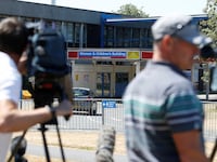 Televisions crews film outside the entrance to the Countess of Chester Hospital, Chester, Britain, July 3, 2018.