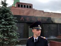 A guard stands in front of the Lenin Mausoleum, where Vladimir Lenin’s remains are displayed, in Red Square, Moscow, Russia.
