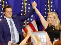 A photo of Rep. Matt Gaetz and Rep. Marjorie Taylor Greene at an “America First” rally in Florida.
