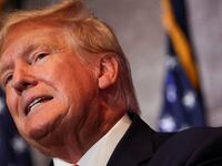 Donald Trump speaks with his head cocked